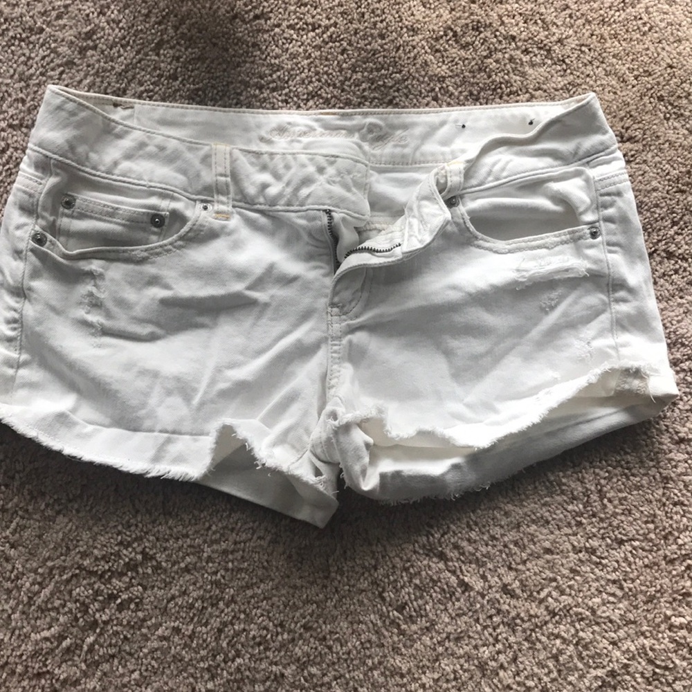 White ripped shorts (missing button)